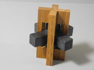 Double Cross Wooden Puzzle 5 Piece With Solution Black & Brown -