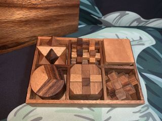 Wooden Brain Teaser Mind Games Mental Stimulation Wood Puzzles In Storage Box 4