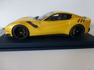 1/18 Ferrari F12 Tdf.  Looksmart.  Yellow With Black And Silver Stripe
