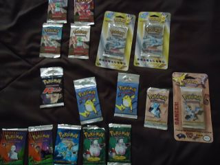 16 Assorted Pokemon Booster Packs: Base Set,  Jungle,  Fossil,  And More