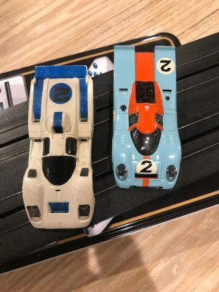 2 Afx Slot Cars - Both - Porsche,  Ferrari