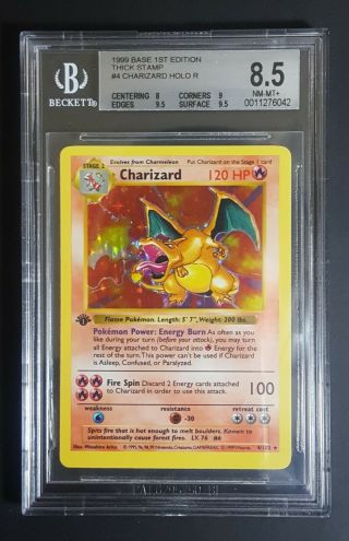 Charizard 1st edition shadowless (base set) BGS 8.  5 with very strong subgrades 2