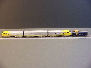 Marklin Z 88190,  Santa Fe“Yellow Bonnet”,  EMD F7 - A/B/A 3 - Diesels,  Caboose,  5 - Pole 4