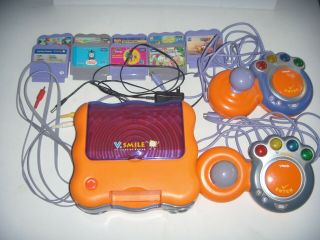 V Tech V Smile Tv Learning System With 2 Controllers,  Supply Cord,  And 10 Games