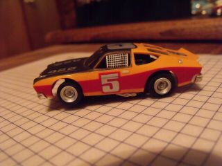 Afx Nascar 5 In Orange,  Yellow,  And Black