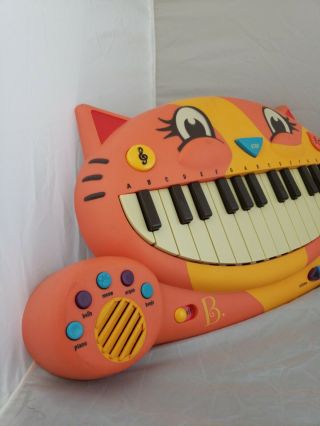 B.  Toys Meowsic Musical Keyboard Microphone Piano Playing Toy 2