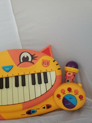 B.  Toys Meowsic Musical Keyboard Microphone Piano Playing Toy 3