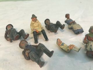Antique Britain LTD Tin Toy People of Village sitting 1940 2