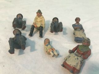 Antique Britain LTD Tin Toy People of Village sitting 1940 3