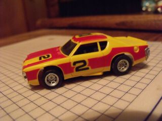 Afx Nascar 2 In Orange And Yellow