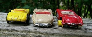 3 Aurora Model Motoring Cars,  a Jaguar,  a Mercedes and a Corvette,  all 6