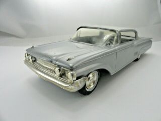 A.  M.  T.  1960 Mercury Park Lane Promo Model Car Metallic Silver Friction Wheels