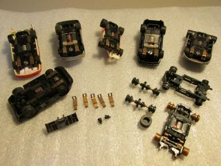 (6) Aurora Tomy cars with extra chassis & parts, 2