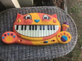 B.  Toys Meowsic Musical Keyboard Microphone Piano Playing Toy Cat Piano