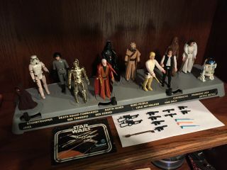 Vintage 1977 Star Wars 12 Action Figures With Action Stand,  Weapons