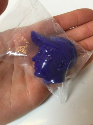 Single KAWS toy head,  purple,  PERMANENT THIRTY THREE 3