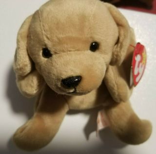 A Ty Beanie Baby Fetch Tan Floppy Ears Puppy Dog Born 4 February 1997