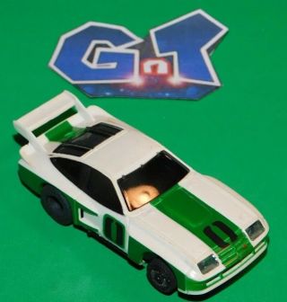 Aurora Afx Tomy Chevy Monza Green White 0 Slot Car Ho Running Chassis