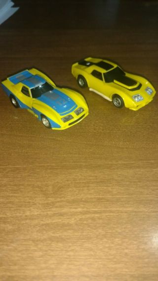 Aurora Afx Lighted Corvette Gt Yellow/ Blue 12 And Yellow And Black Corvette.
