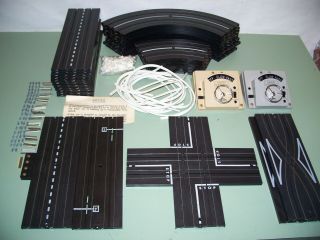 Aurora Model Motoring Ho Scale Slot Car Track And Accessories