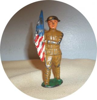 Soldier Marching With Flag Short Stride Tin Helmet Barclay / Manoil