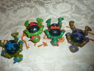 Vintage TMNT Ninja Turtles Set of 4 Storage Shells Action Figures w/Weapons K1 4