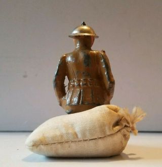 SOLDIER SITTING ON TRENCH BAG W/ RIFLE BARCLAY MANOIL 2
