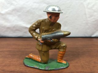 Vintage Wwi Doughboy Soldier With A Artillery Shell Die - Cast Metal Toy Army Man
