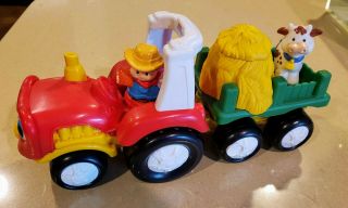 Fisher price little people farm tractor with pop up pig 2