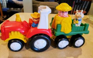 Fisher price little people farm tractor with pop up pig 4