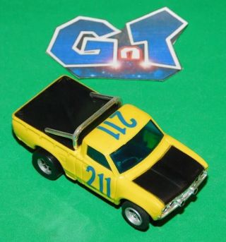 Aurora Afx Tomy Nissan Datsun Pick Up Truck Yellow Slot Car Ho Running Chassis
