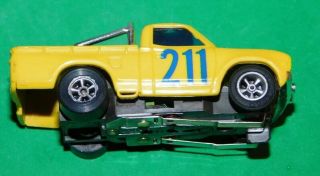 AURORA AFX TOMY NISSAN DATSUN PICK UP TRUCK YELLOW Slot Car HO Running Chassis 2