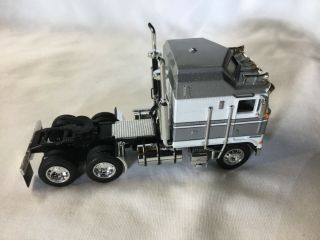 Dcp 1:64 Kenworth K100 Silver And White Aerodyne With Black Frame