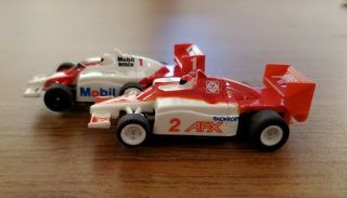 Nascar and Formula One 1/64 4 slot car bodies and chassis 3
