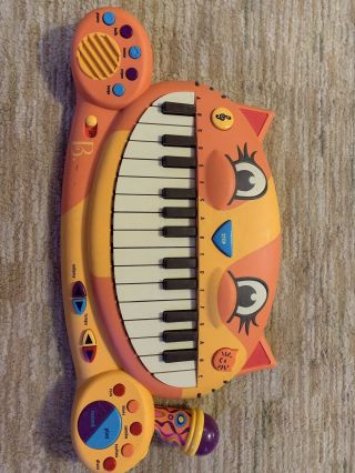 B.  Toys 204 - 06 - 0411 Meowsic Musical Keyboard Microphone Piano Playing Toy