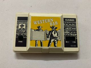 Casio Cg - 300 Western Bar Lcd Handheld Electronic Video Game 1984