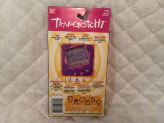1997 Bandai Tamagotchi Yellow With Purple Buttons 3