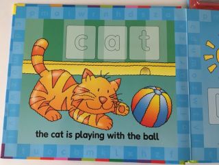 Magnetic Play and Learn First Words Book with 27 magnetic letter tiles 2