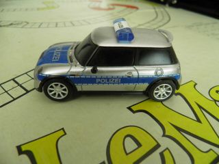 Carrera Go 61089 Mini Cooper S " Polizei D " (mit Blaulicht) 1:43 Slotcar Auto