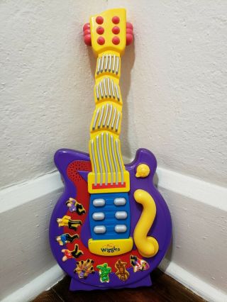 The Wiggles Wiggley Guitar Purple Electronic Musical Dancing Guitar Toy