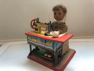Vintage 1950s Battery Operated Tin Toy Dolly Dressmaker By Nomura