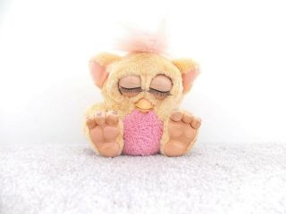 Furby Baby With Rubber Feet.  Tiger Electronics,  2005.  In