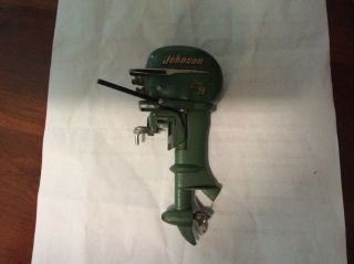 Johnson Electric model boat motor,  vintage,  battery operated toy outboard no.  2 2