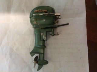 Johnson Electric model boat motor,  vintage,  battery operated toy outboard no.  2 3
