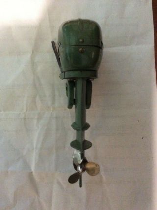 Johnson Electric model boat motor,  vintage,  battery operated toy outboard no.  2 4