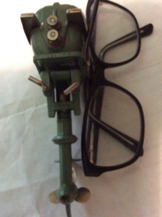 Johnson Electric model boat motor,  vintage,  battery operated toy outboard no.  2 5