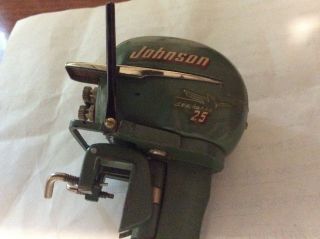 Johnson Electric model boat motor,  vintage,  battery operated toy outboard no.  2 7