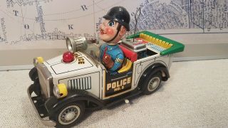 Tin Toy Police No.  5,  Car,  Nomura Japan Battery Operated - -