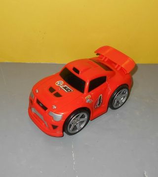 2007 Mattel Shake N Go Orange Sports Car W/ Spoiler 4 Race Car K5874
