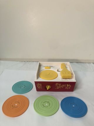 Vintage Fisher Price Record Player With 4 Discs Wind Up Music Box -
